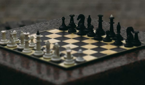 A minimalist photo of a chess board symbolizing calculated real estate pricing strategy and market moves.